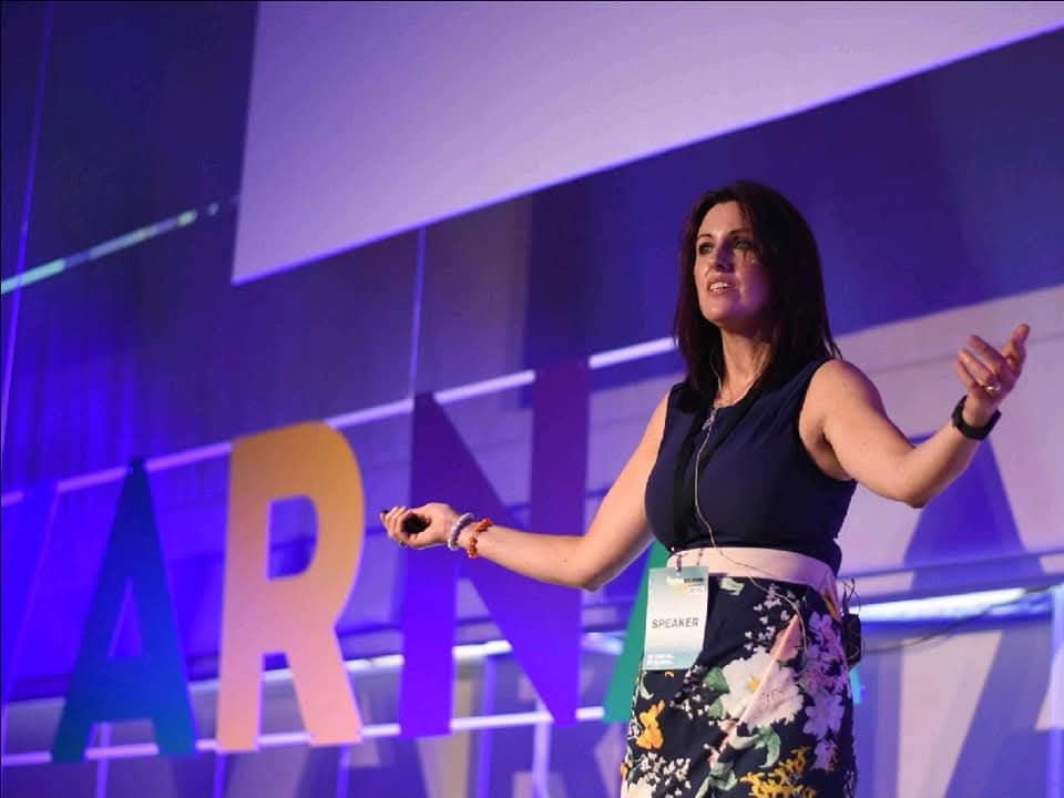 Louise McDonnell delivering a keynote talk on marketing strategy